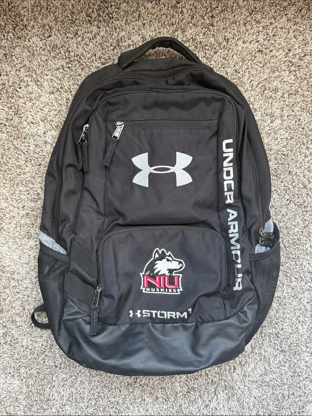 UA Storm Hustle II Backpack with NIU Huskies Logo
